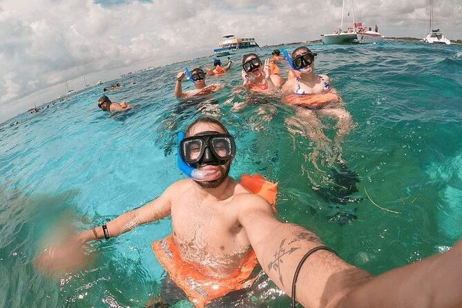 Deluxe Catamaran to Isla Mujeres, with Drinks, Snorkel & Buffet - Spinnaker Flying Depends on the Weather