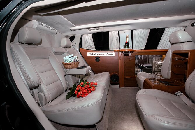 Deluxe GMC Limousine from CUN Airport to Cancun Hotel Zone - Finding the right person at Terminals 2, 3, and 4