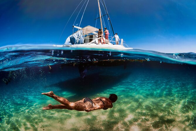 Discover Isla Mujeres: Catamaran, Snorkeling, and "Ice Bar" - Sailing from Cancun with an open bar