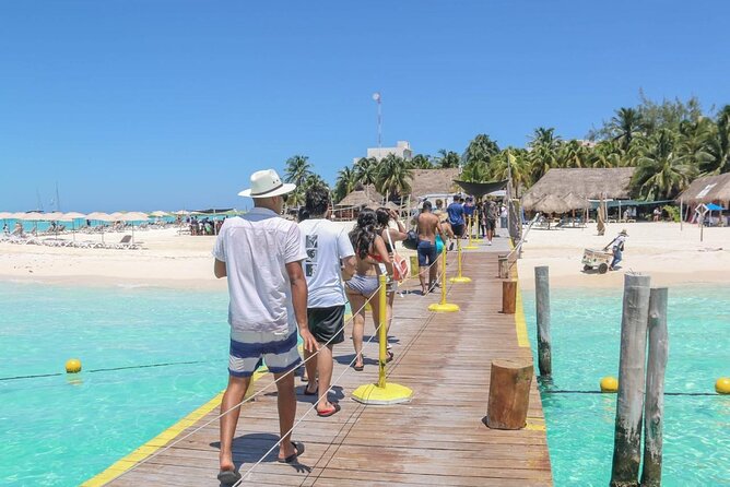 Discover Isla Mujeres: Catamaran, Snorkeling, and "Ice Bar" - Pickup areas and timing