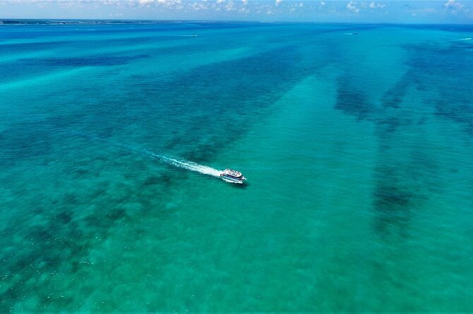 Discovering Isla Mujeres on a Double Decker Catamaran - The return ride with Cancun sunset views
