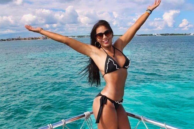 Discovering Isla Mujeres on a Double Decker Catamaran - Lunch and open-bar service on the catamaran