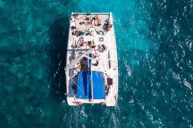 Exciting Catamaran Tour to Isla Mujeres, from Cancún! - Beach-club lunch and practical details