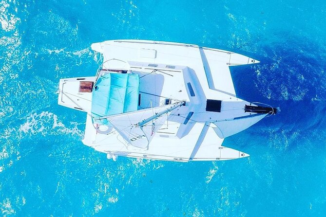 Exciting Catamaran Tour to Isla Mujeres, from Cancún! - Crew, music, and the group atmosphere