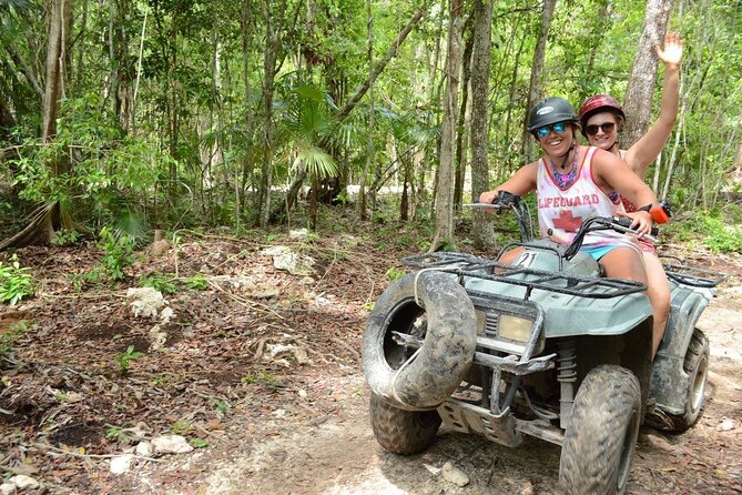 Experience ATV (shared) Ziplines & Cenote with Lunch from Cancún - Cooling off in a clear cenote