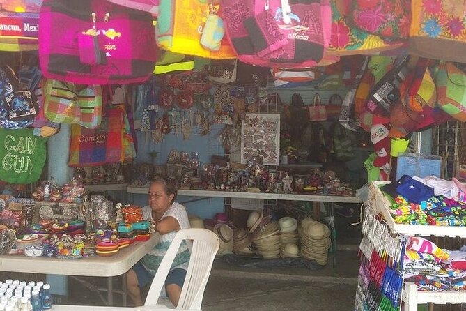 Explore Cancun City Tour! Round Bus transportation - Mercado 28 for souvenirs, food, and bargaining