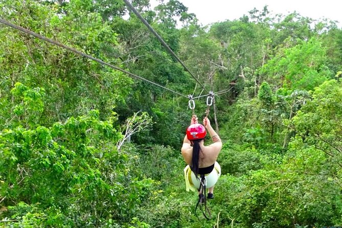 Family ATV Cenote Five Zip Lines Photos Taco Lunch Tequila Taste - ATV riding through the jungle