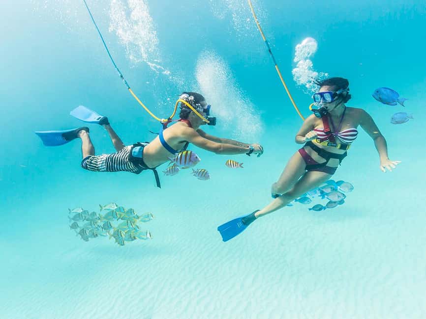 From Cancun: Xcaret Park All-Inclusive - Swimming through the three underground rivers