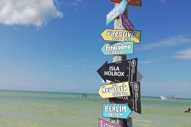 Full Day Tour of Isla Holbox and Isla Pasión with Cenote - Guide service and group size