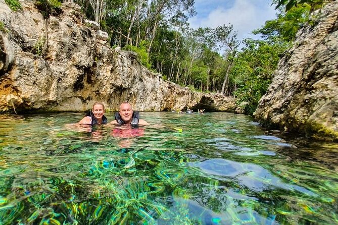 Full-Day Tour of Tulum Ruins and Cenotes with Lunch - What the water experience feels like