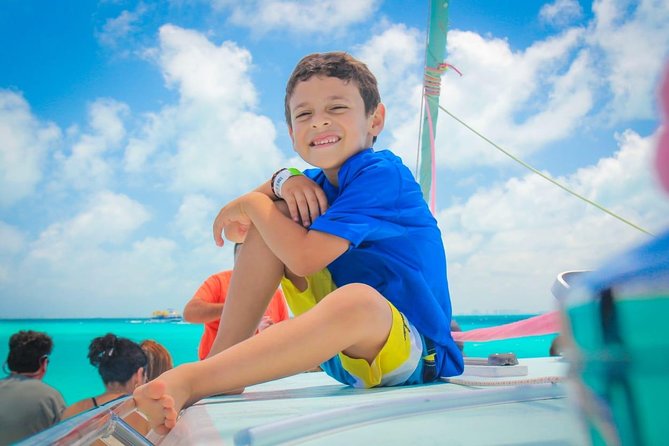 Half Day “LITE TOUR” to Isla Mujeres - Guacamole, drinks, and a music-filled return