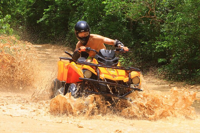 Hidden Cenote Swim & ATV Jungle Adventure with Transportation - Riding the Can-Am Outlander through the trees