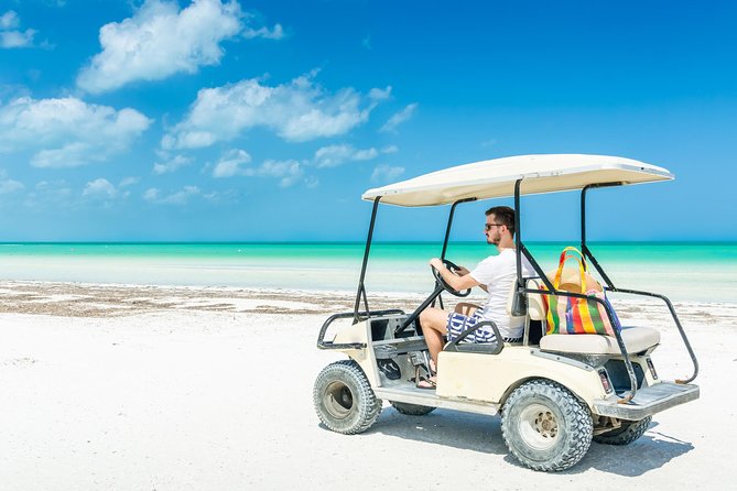 Holbox tour from Cancun and Riviera Maya - Swimming at cenote Yalahau