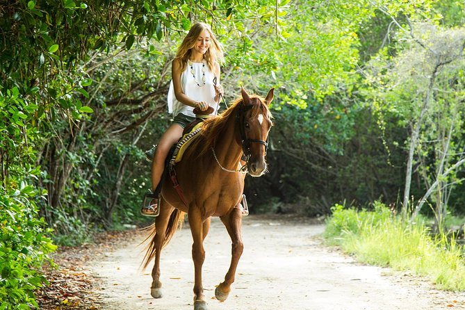Horseback Riding + ATV + Cenote + Zip-Line from Cancun and Playa del Carmen - ATV riding through the ranch