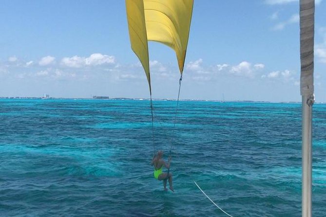 Isla Mujeres adventure by Catamaran. Snorkel, open bar and lunch - The spinnaker option depends on the weather