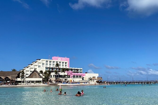 Isla Mujeres Basic Tour in Catamaran with Snorkel and Open Bar - The return sailing, music, drinks, and a sandbank option