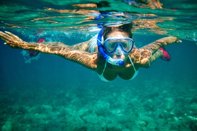Isla Mujeres Catamaran Sailing Experience with Lunch & Open Bar - A short snorkeling stop in the open sea