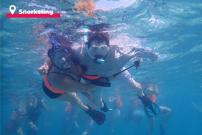 Isla Mujeres Catamaran + Snorkel + Open Bar on board + Buffet - The real cost at $38.90 per person