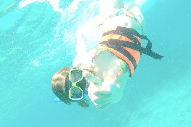 Isla Mujeres Catamaran Tour from Cancun with Snorkel and Open Bar - Spinnaker flying and the onboard party