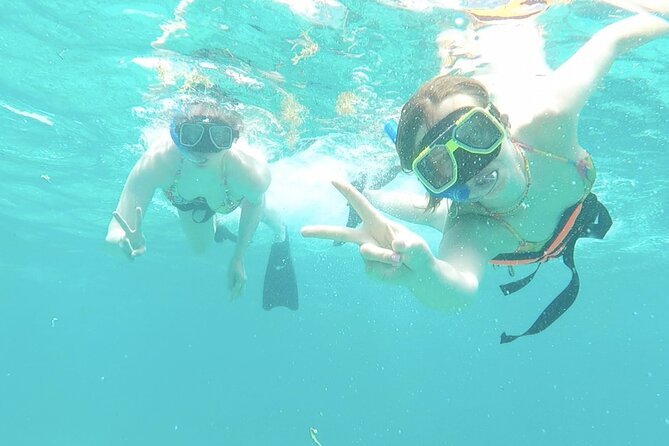 Isla Mujeres Catamaran Tour from Cancun with Snorkel and Open Bar - Isla Mujeres in a 1.5-hour window