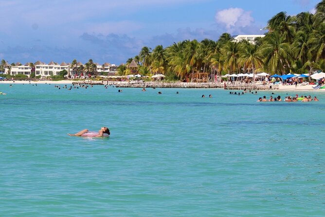Isla Mujeres Catamaran Tour with Snorkeling at MUSA, Buffet Lunch & Open Bar - Playa Norte and the final swim
