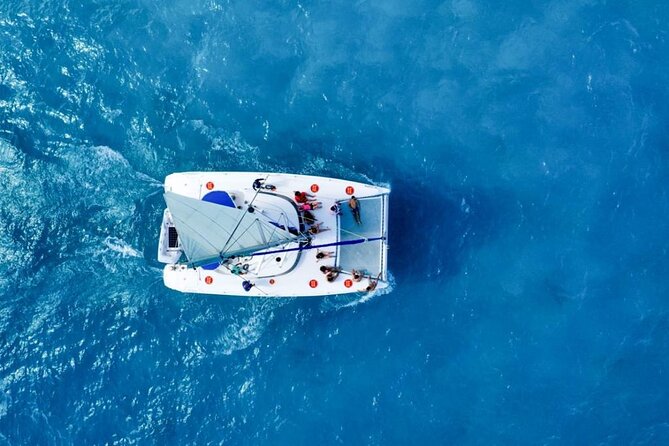Isla Mujeres: Catamaran Tour with Snorkeling Food, Drinks, Beach - Isla Mujeres town, beaches, and shopping time