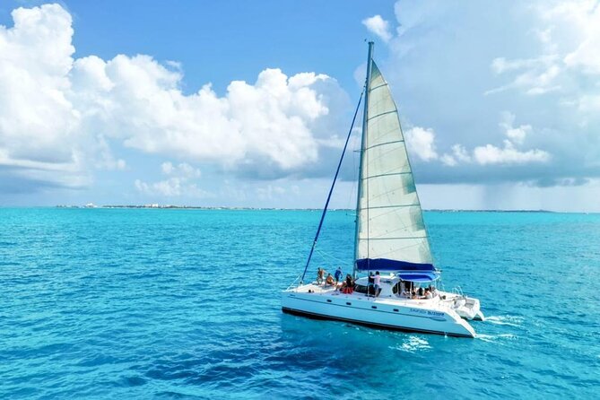 Isla Mujeres: Catamaran Tour with Snorkeling Food, Drinks, Beach - The spinnaker flight and the party ride home
