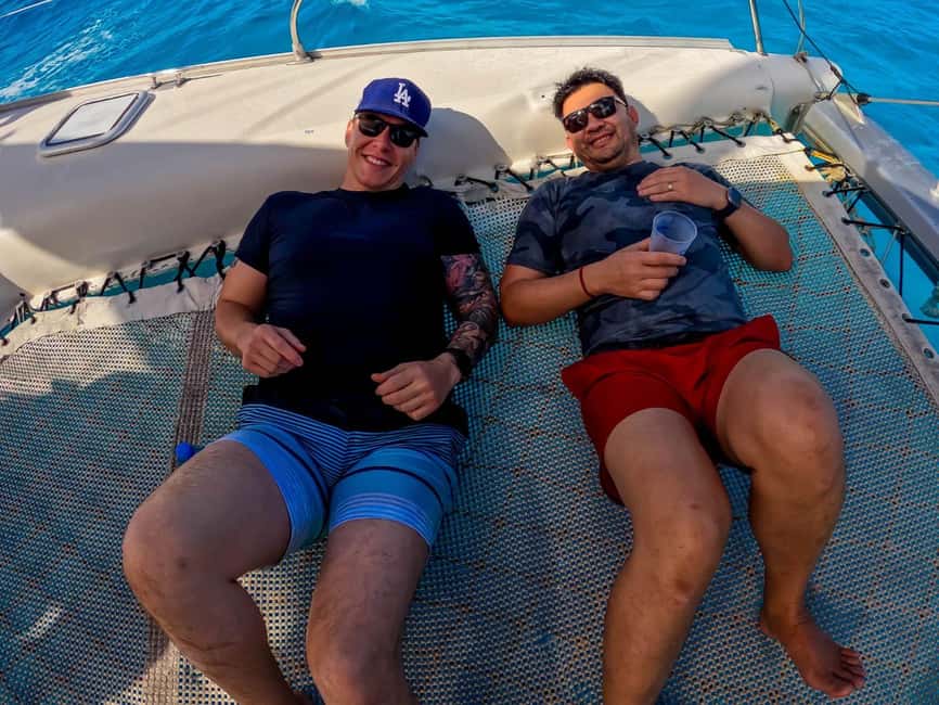 Isla Mujeres Catamaran Tour with Snorkeling & Open bar - Who should book this Isla Mujeres catamaran trip?