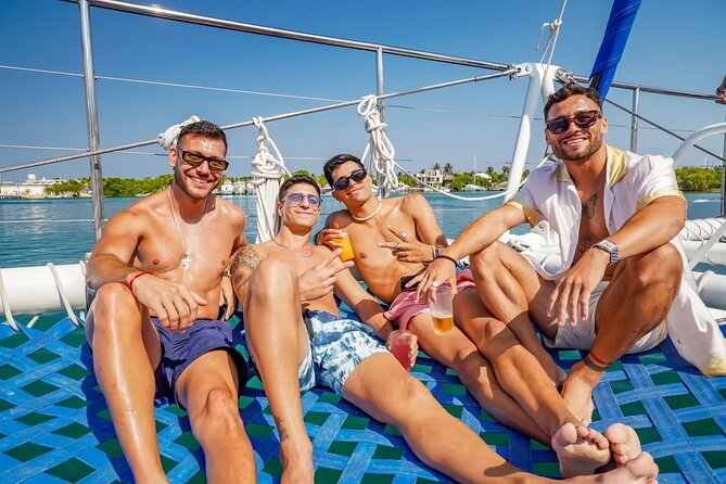 Isla Mujeres Cruise with Beach Club, Snorkel, Lunch and Open Bar - The return cruise and the party atmosphere