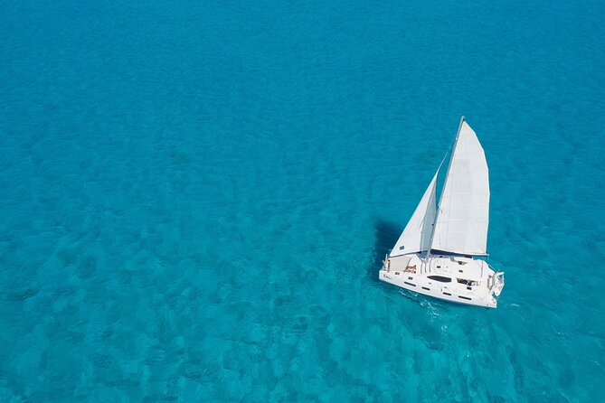 A catamaran anchored on the shallows off Isla Mujeres