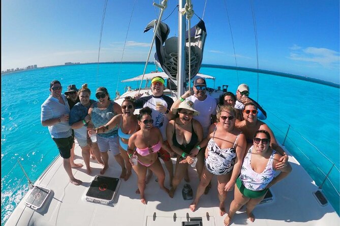 Isla Mujeres Premium Catamaran Tour with transportation from Playa del Carmen - English service and the feel onboard