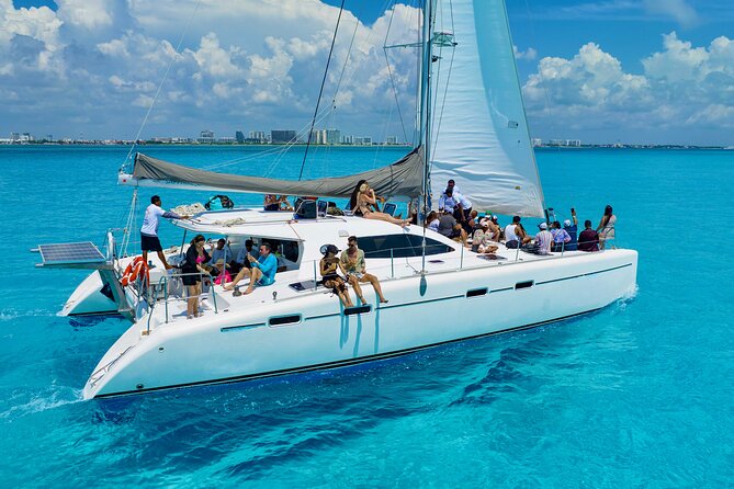 Isla Mujeres Spring Break Party Catamaran Snorkel and Open Bar - Setting sail from Playa Tortugas at 10:30 a.m.
