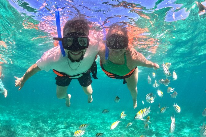Isla Mujeres Spring Break Party Catamaran Snorkel and Open Bar - Returning to Cancun with music and drinks