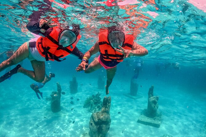 Isla Mujeres Spring Break Party Catamaran Snorkel and Open Bar - The first sail across Cancun’s Caribbean coast