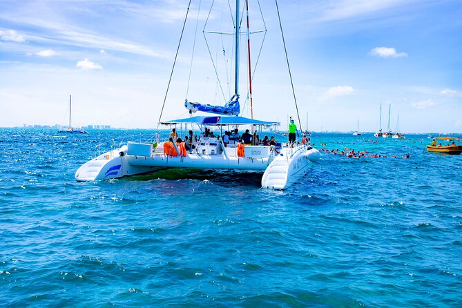 Isla Mujeres Tour on Catamaran with Snorkel, Open Bar, Buffet & Beach club - Snorkeling at El Meco Reef