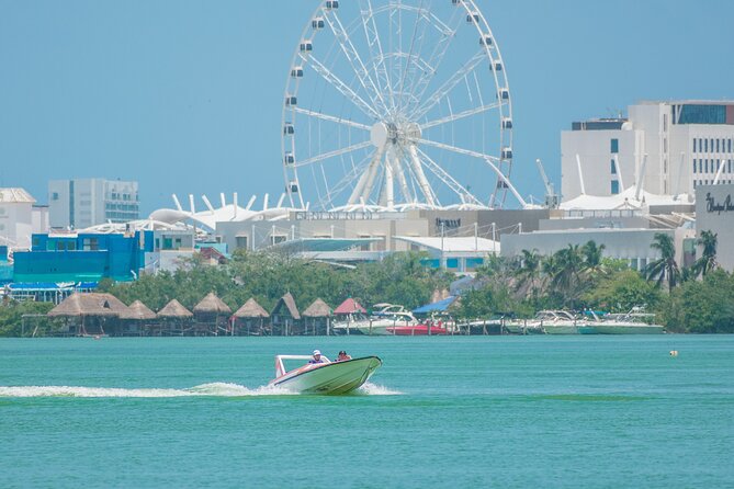 Jungle Tour & Snorkel at Punta Nizuc Reef , Underwater museum - Taking the wheel at Marina Puerto Madero
