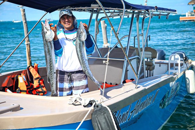 Local Fishing Plus Snorkeling Tour in Isla Mujeres - Guides, boat handling, and the feel of the day