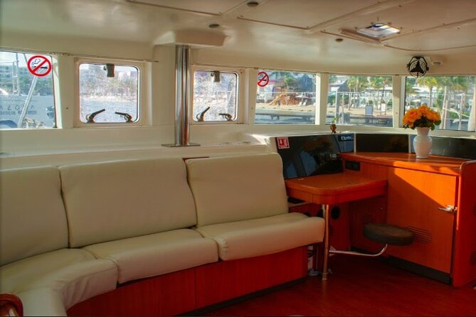 Luxury Catamaran Tour to Isla Mujeres with Transportation - Lunch and water sports at Club Playa Mexico
