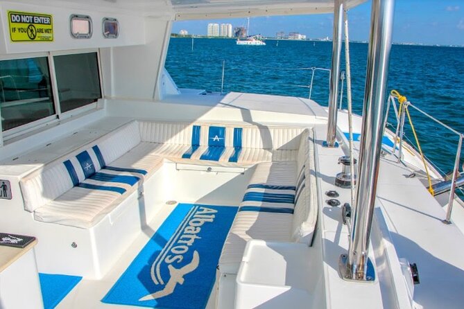 Luxury Catamaran Tour to Isla Mujeres with Transportation - The ride home, music, and possible spinnaker flight