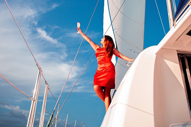 Luxury Sunset Sailing Cruise in Cancun with Light Dinner and Open Bar - Crew service, music, and the feeling onboard