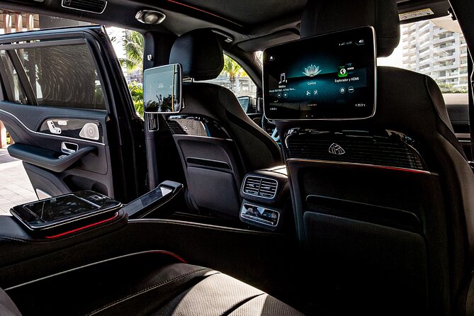 Luxury Transfers in a Mercedes Maybach GLS 600 - Drivers Alfredo and Edgar add a personal touch
