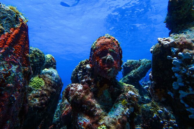 MUSA Museum and Colorful Reef 2 Tank Dive-Certified Divers - Manchones Reef adds the natural counterpart