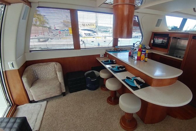 Playa Mujeres rent a Yacht 4hrs with Food and drinks aboard CA55 - Playa Norte for swimming and downtime