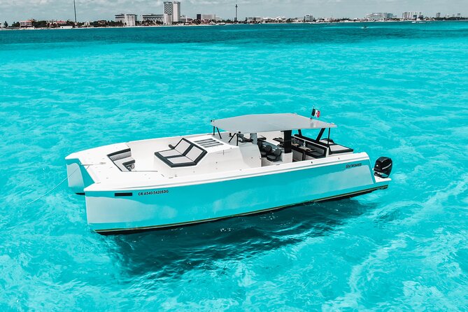 Private Atomic Catamaran Tour to Isla Mujeres - Leaving Playa Tortugas for Isla Mujeres
