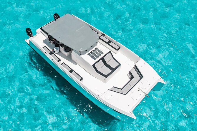 Private Atomic Catamaran Tour to Isla Mujeres - Snorkeling equipment and time at sea