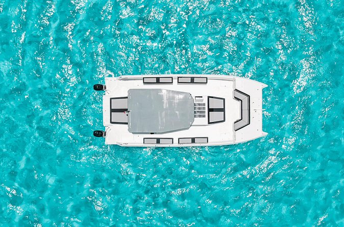 Private Atomic Catamaran Tour to Isla Mujeres - What the crew service adds to the day