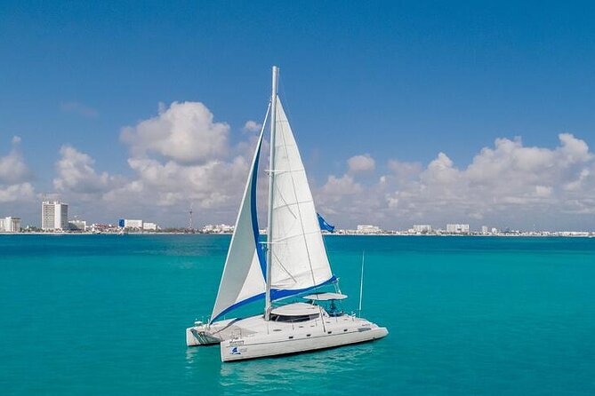 Private Catamaran from Cancun to Isla Mujeres | For up to 40 pp - Spinnaker sailing, music, and the open bar