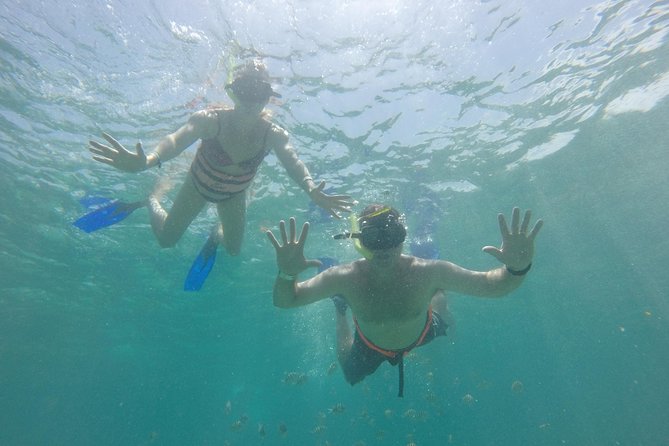 Private Catamaran Tour to Isla Mujeres with Snorkeling from Cancun - Calle Hidalgo and the island’s town center