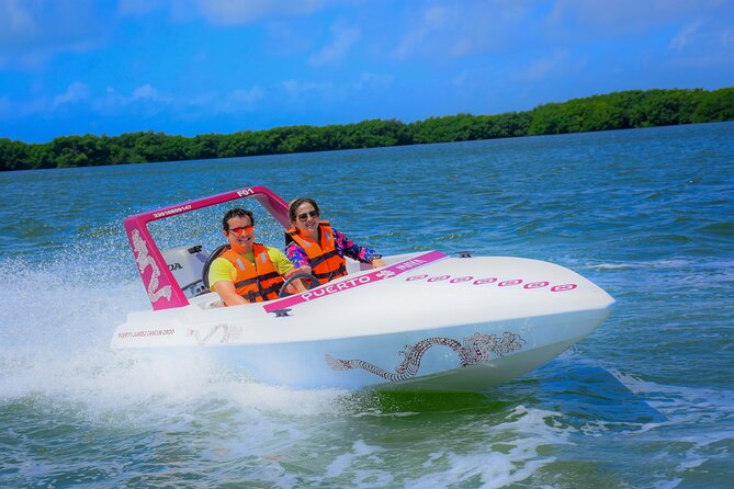 Reef Snorkeling & Jungle Speedboat Adventure with Mayan Ceremony - Driving through Nichupte Lagoon