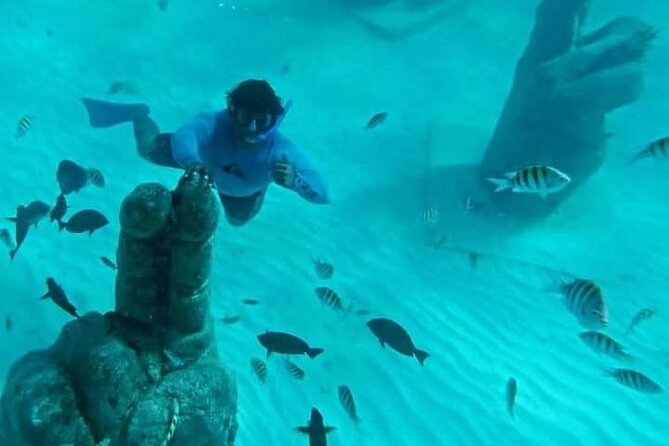 Sail Away Catamaran Day Trip with Snorkeling to Isla Mujeres - What the price includes, and what it does not